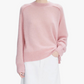 Pink sweater on a white background