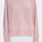 Pink sweater on a white background