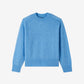 Blue sweater on a white background