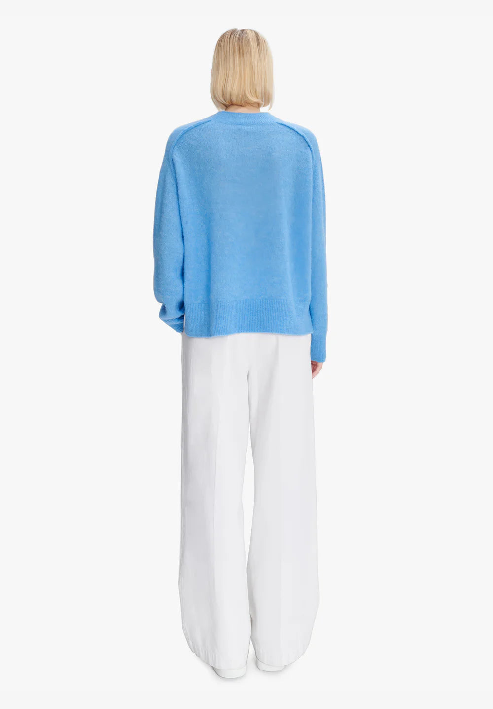 Blue sweater on a white background