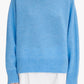 Blue sweater on a white background