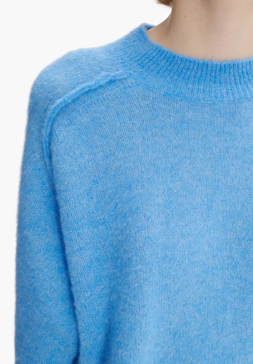 Blue sweater on a white background