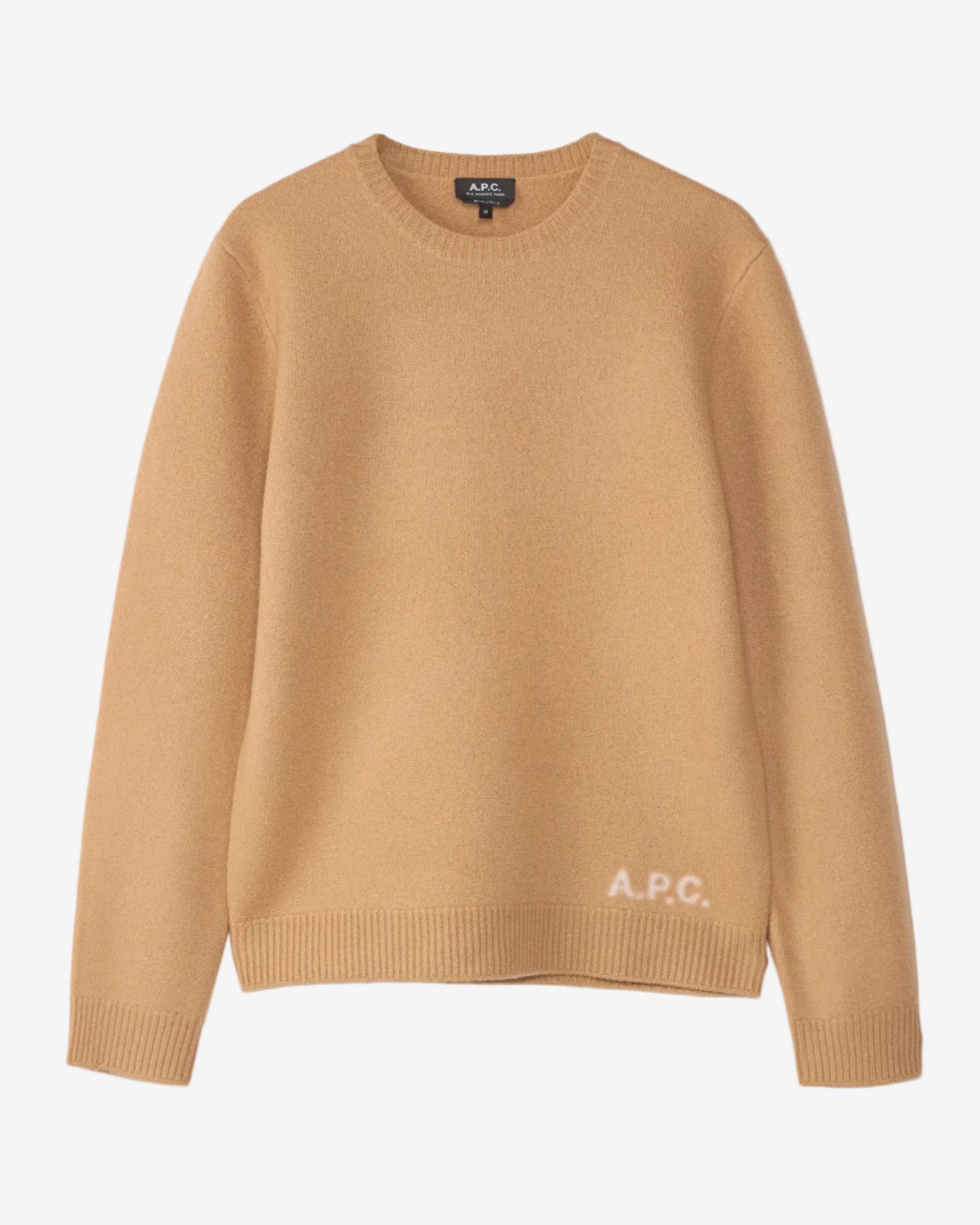 Beige sweater with 'A.P.C.' branding on a light gray background