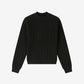 Black ribbed sweater on a white background