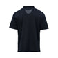 Black polo shirt on a white background