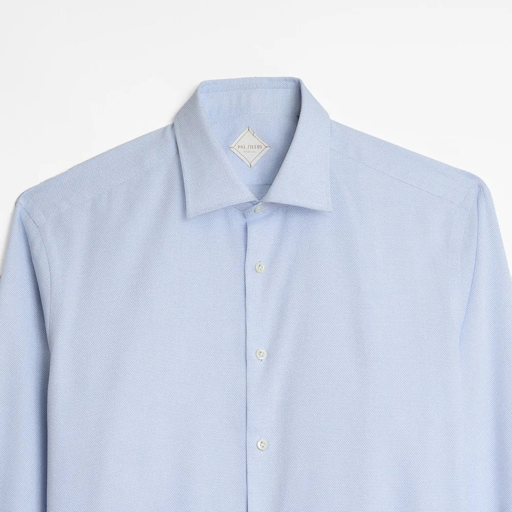 Light blue dress shirt on a white background
