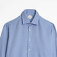 Light blue dress shirt on a white background