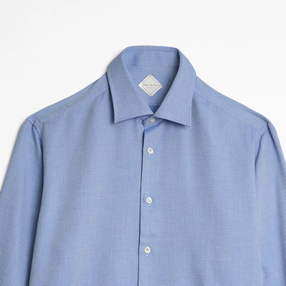 Light blue dress shirt on a white background
