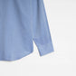Light blue dress shirt on a white background