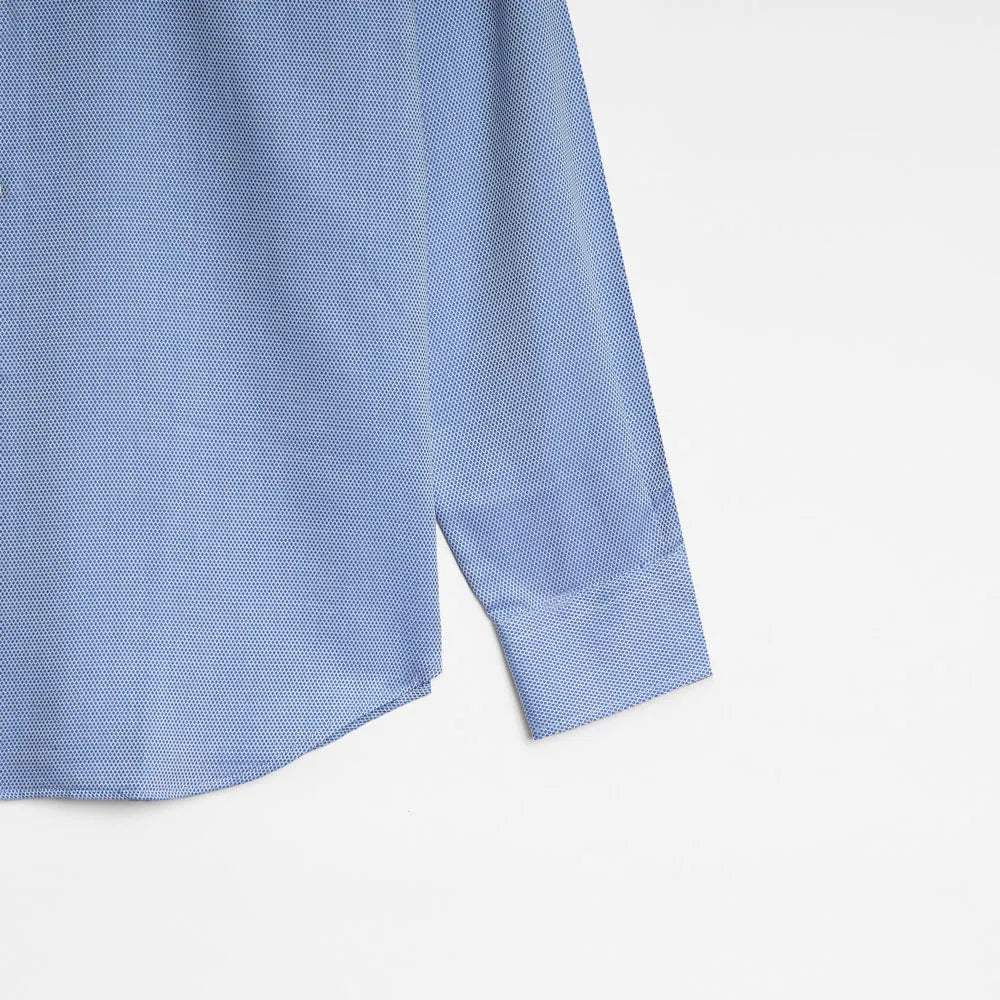 Light blue dress shirt on a white background