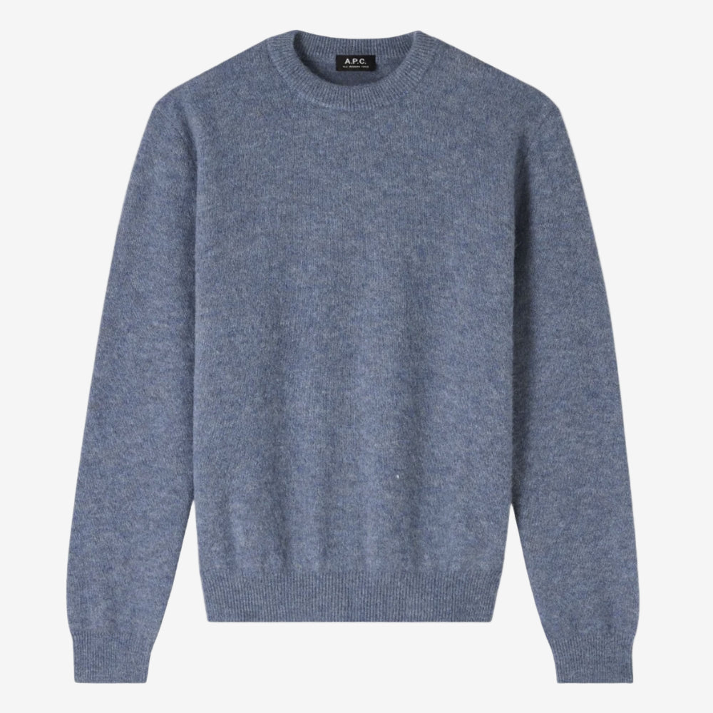 Blue sweater with 'A.P.C.' branding on a white background