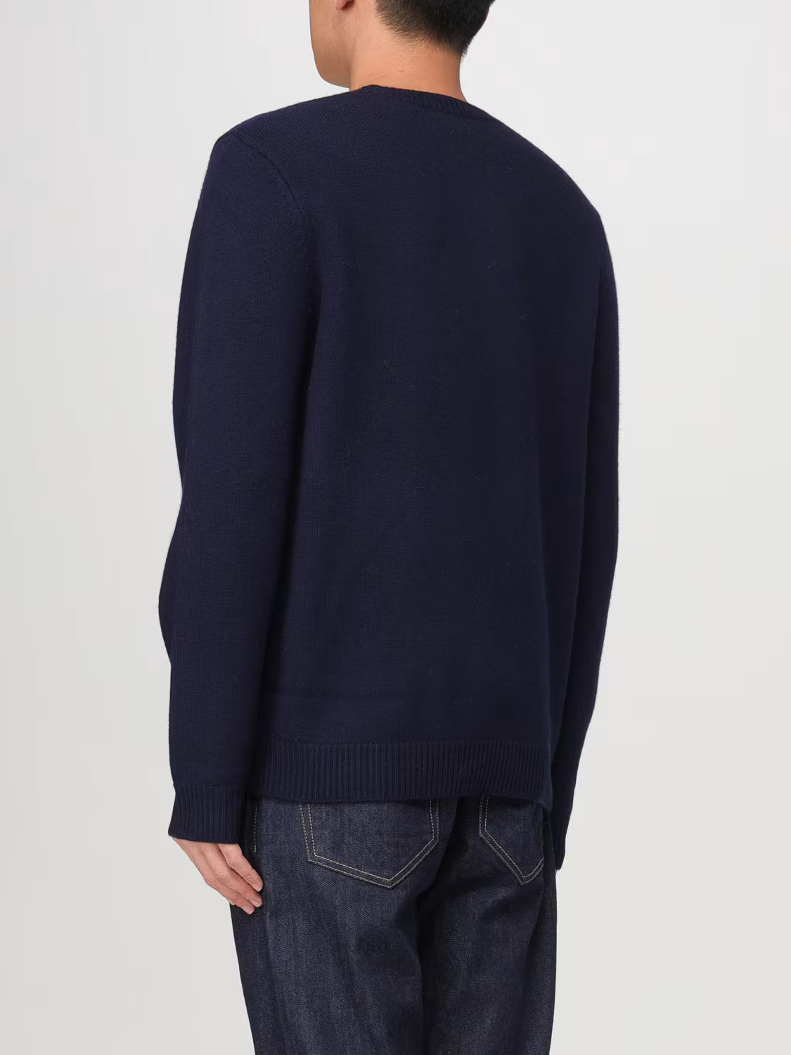 Navy blue sweater with A.P.C. branding on a white background