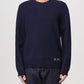 Navy blue sweater with A.P.C. branding on a white background