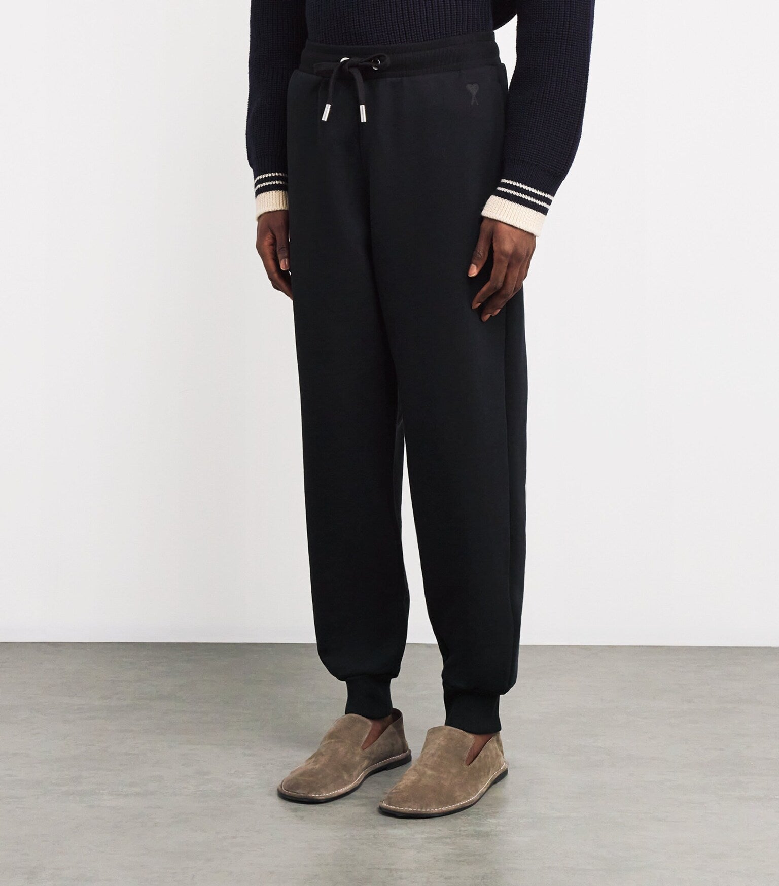 Black sweatpants on a white background