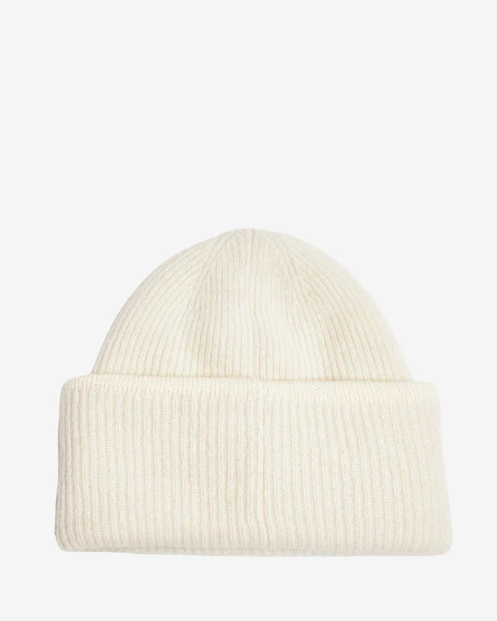 Beige knit sweater with 'Jacquemus' branding on a light background