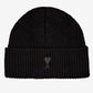 Black knit beanie with a small logo on a white background