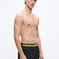 Men's black swim shorts with logo waistband