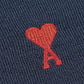 Navy blue sweater with a red heart and letter 'A' logo on a white background