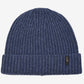 Blue knit beanie with a small logo on a white background