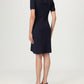 Navy blue dress with a collar on a white background