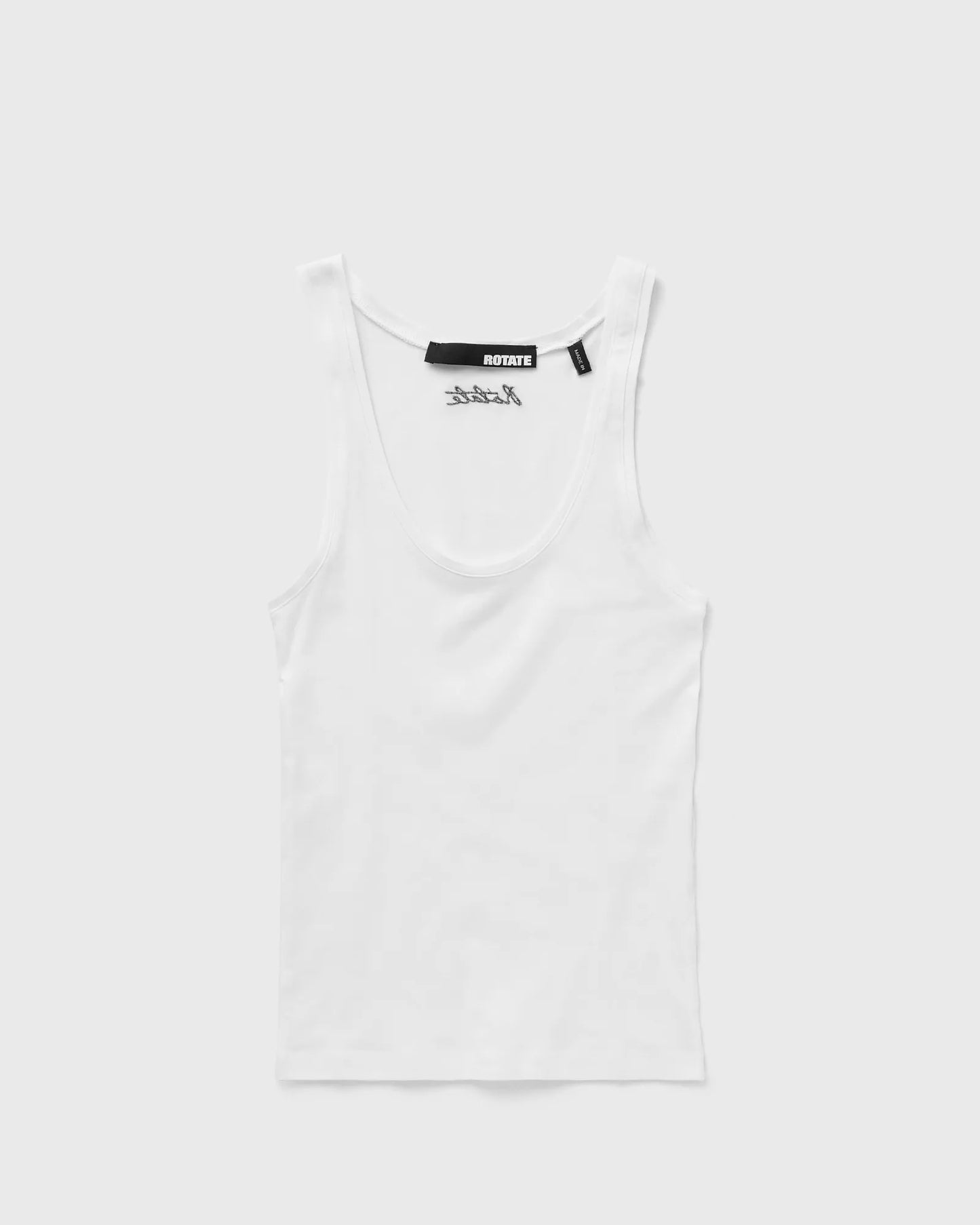 White tank top with a brand label on a light gray background