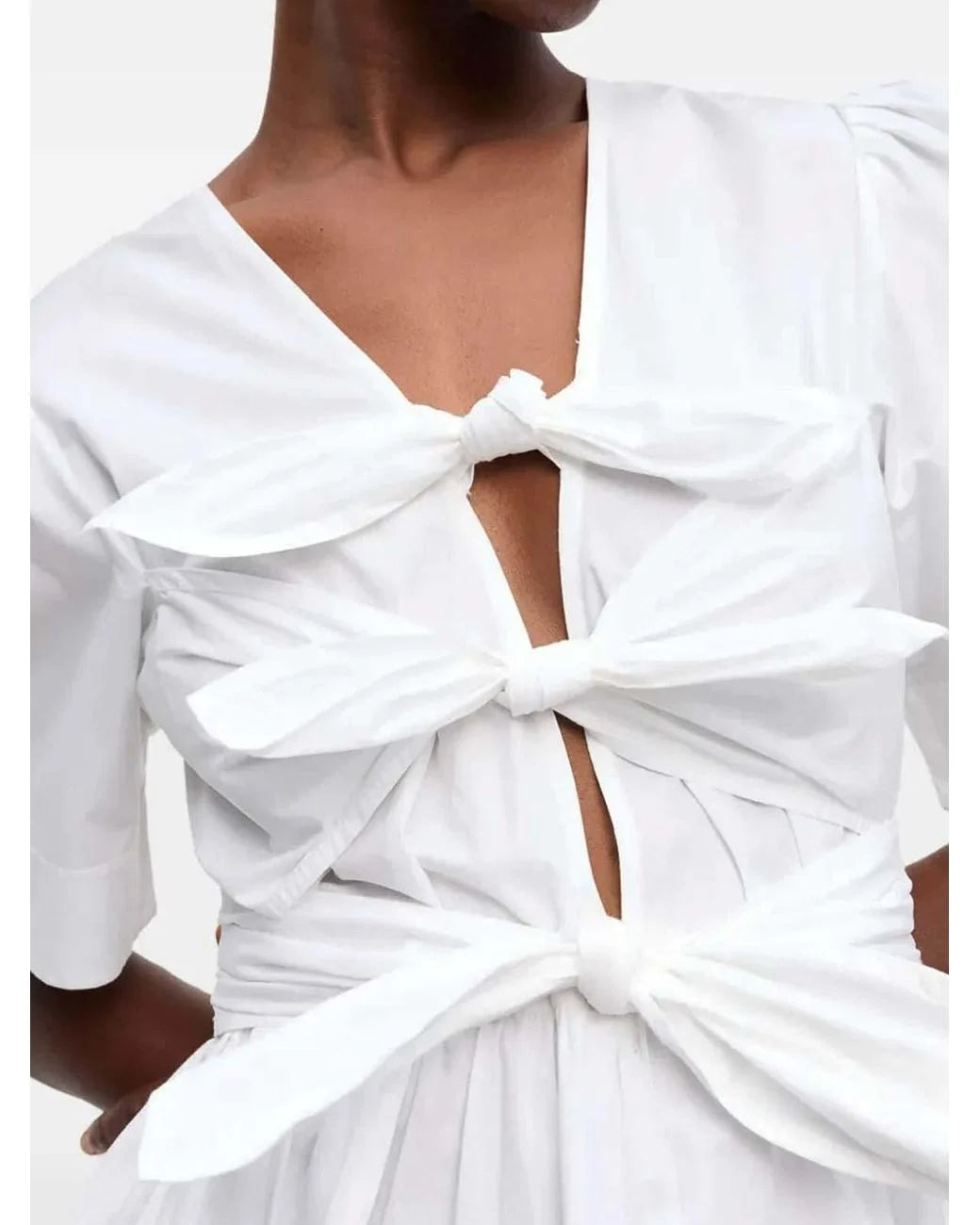 White Dress with decorative ties Ganni