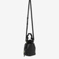 Black leather bucket bag with a strap on a white background