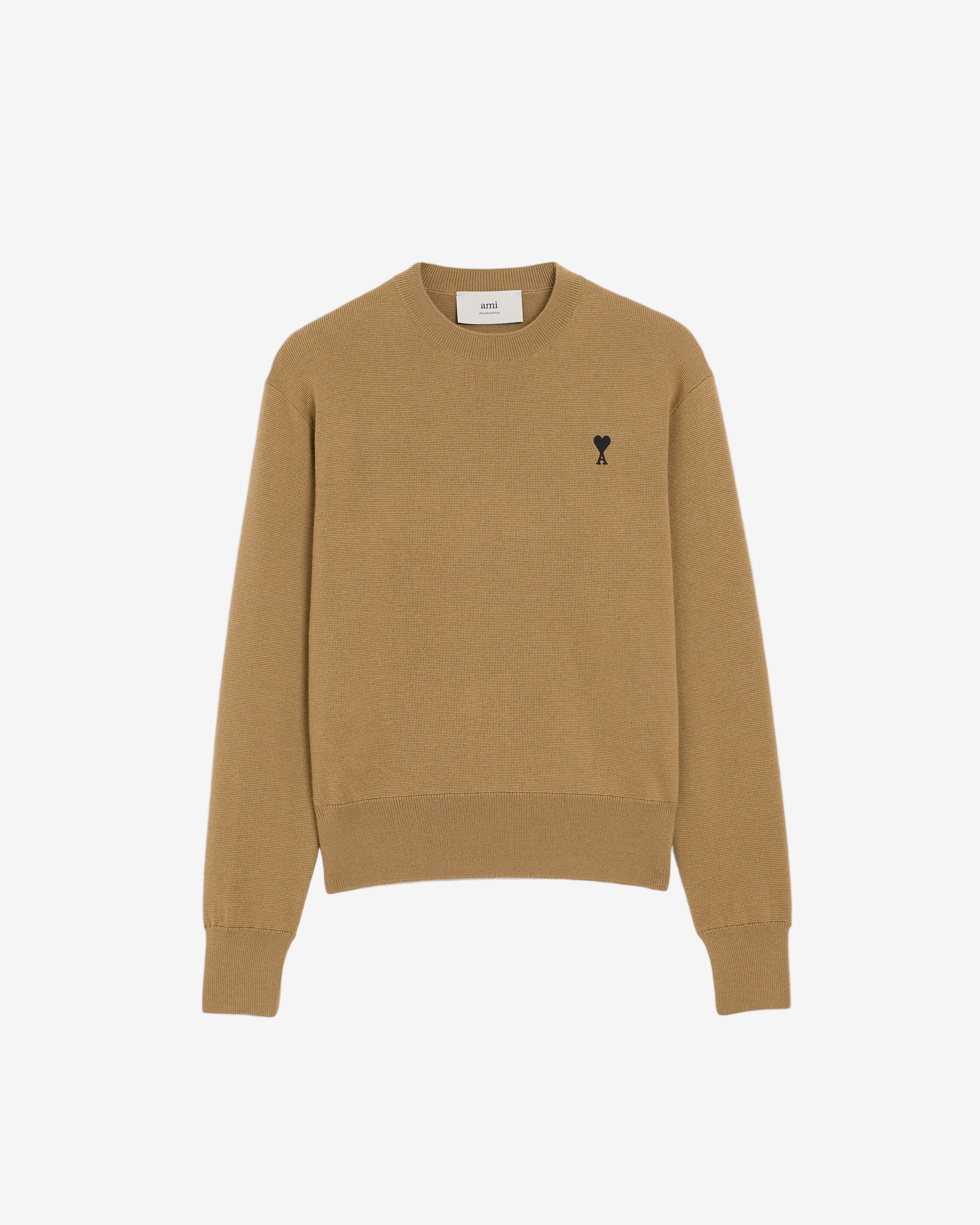 Beige sweater with a small black logo on a beige background ami paris SKU: FKS826.001