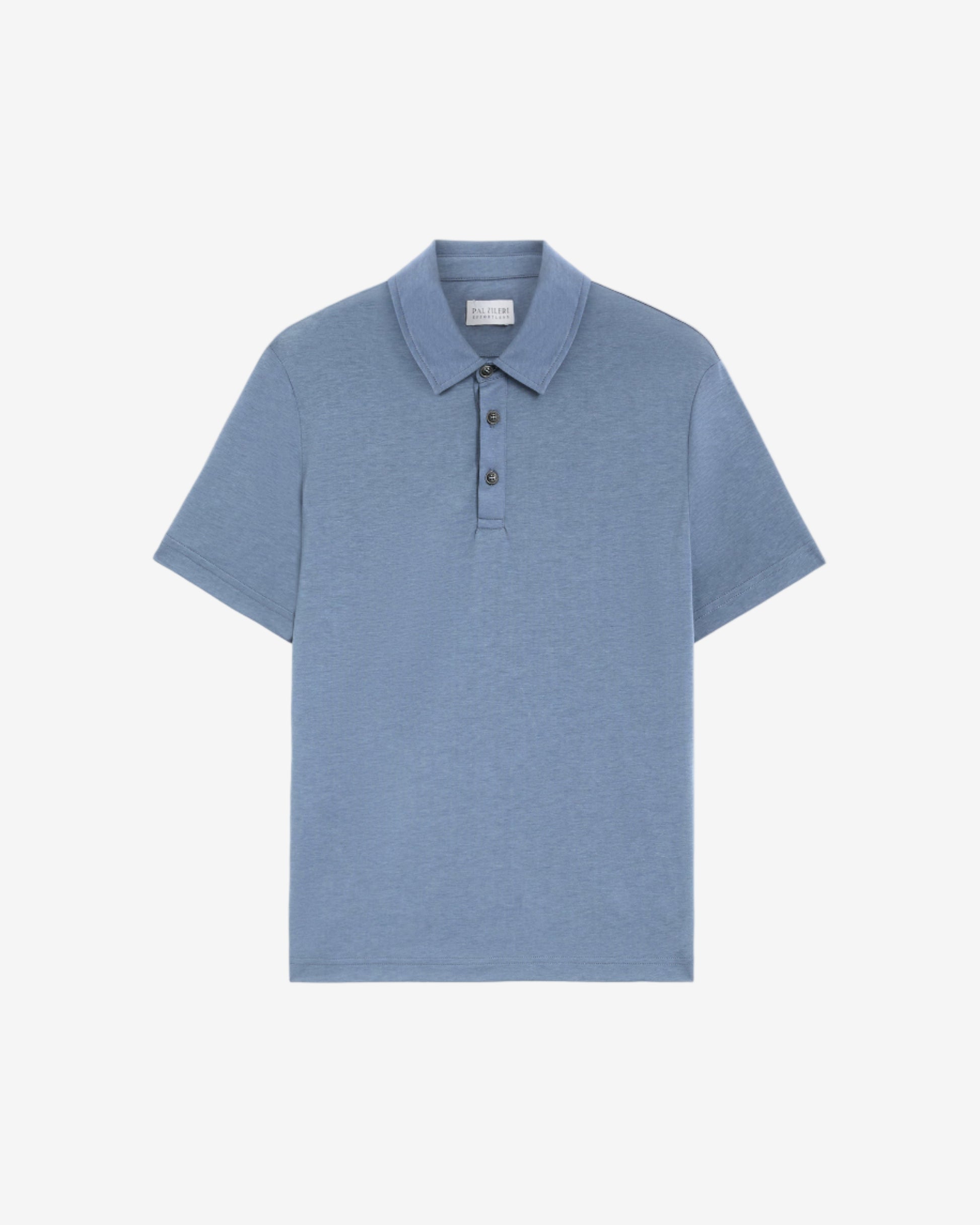 Blue polo shirt on a light gray background