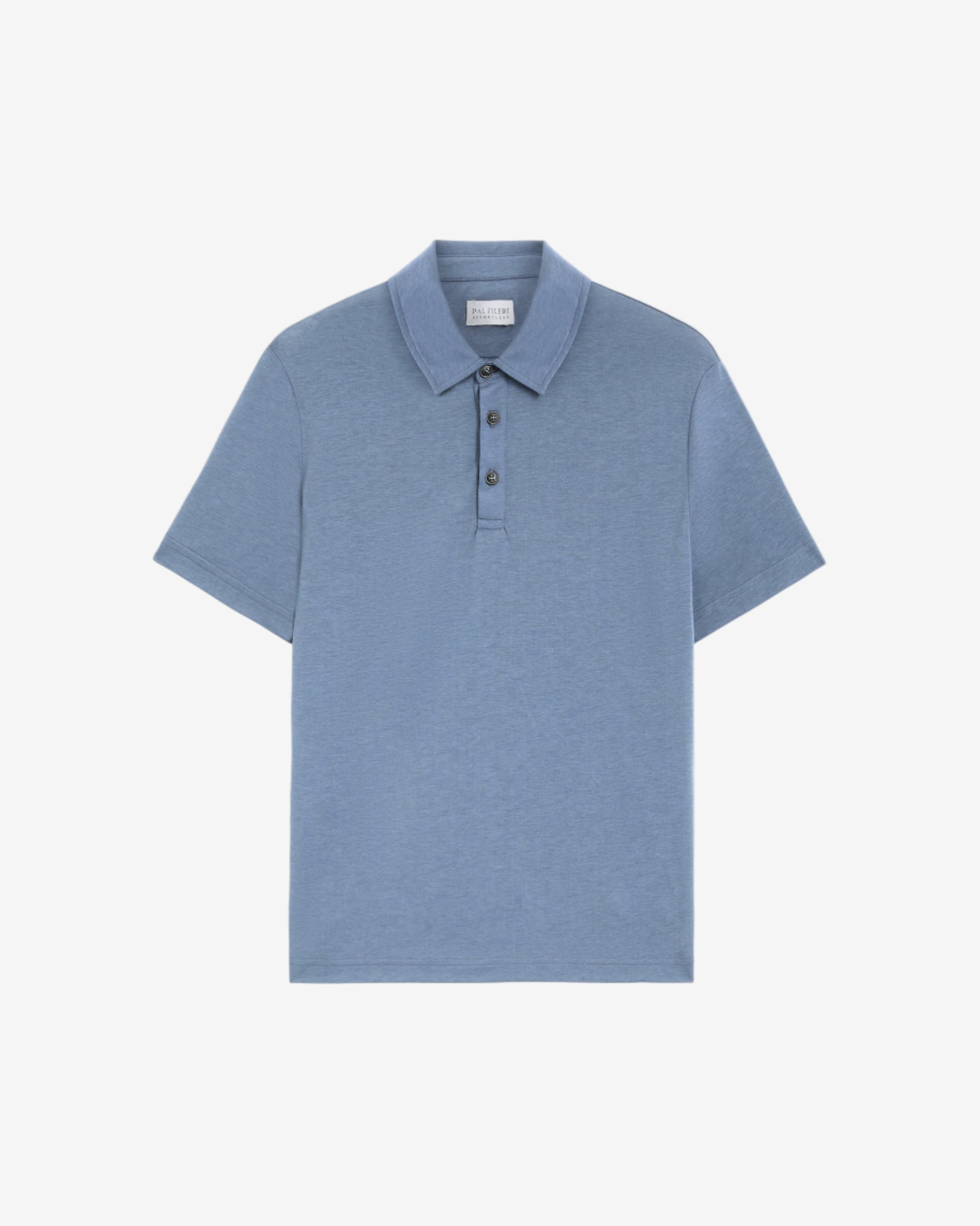 Blue polo shirt on a light gray background