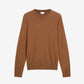 Brown sweater on a light gray background