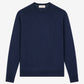 Navy blue sweater on a light gray background
