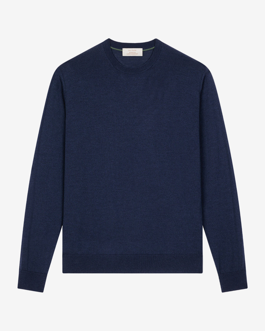 Navy blue sweater on a light gray background