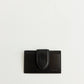 Black leather cardholder on a white background